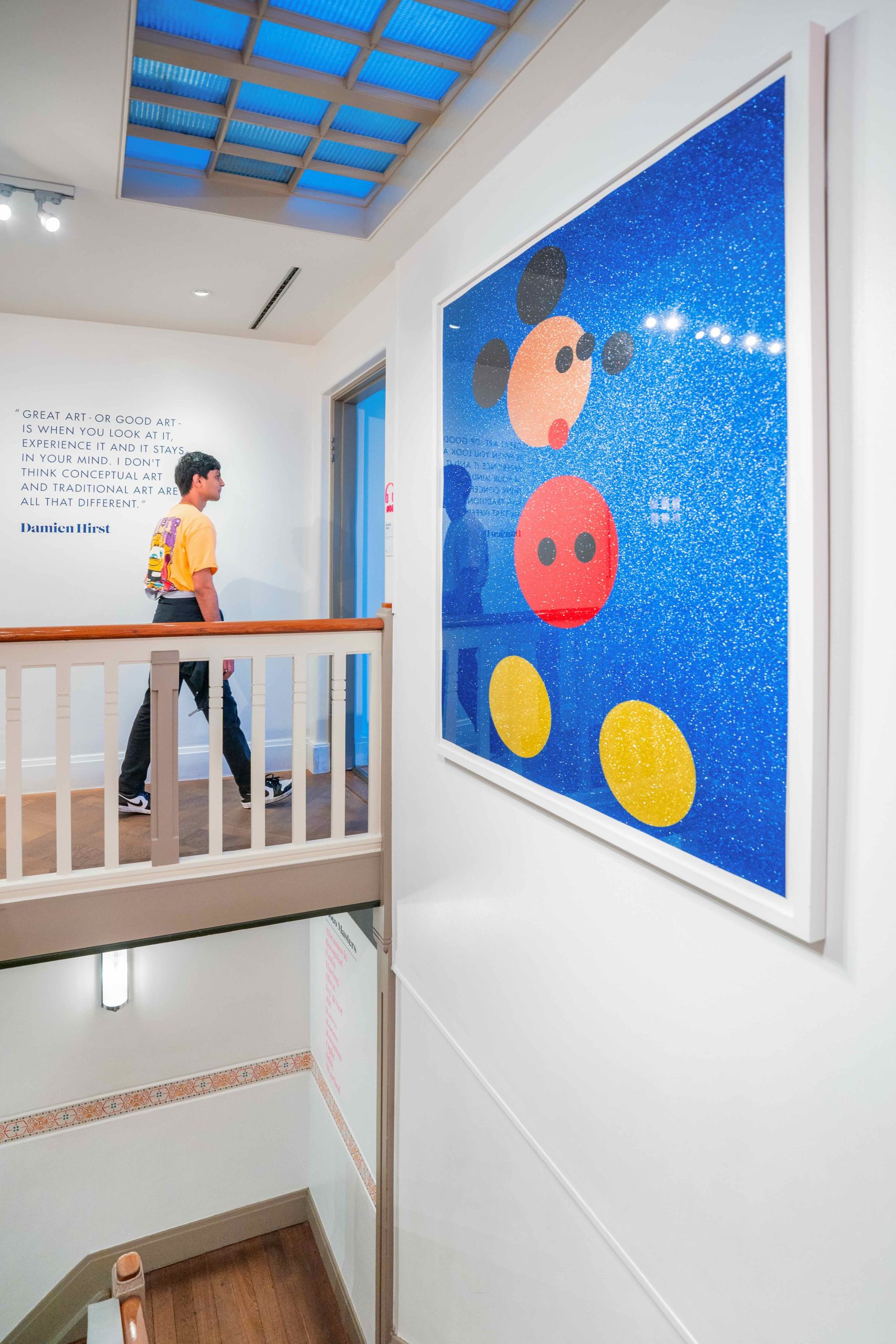 Large Takashi Murakami artwork featuring Mickey Mouse at Moco Museum Amsterdam.