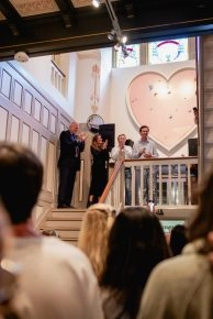 Guests applauding speaker during private event at Moco Museum Amsterdam